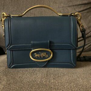 NWOT Coach Riley 18 in Peacock